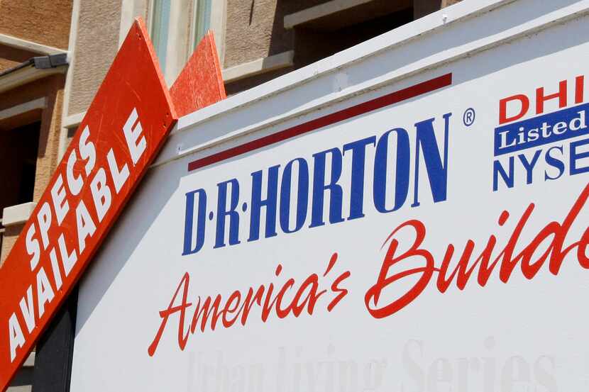 In this May 7, 2009 file photo, a sign advertising homes built by D.R. Horton Inc. is...