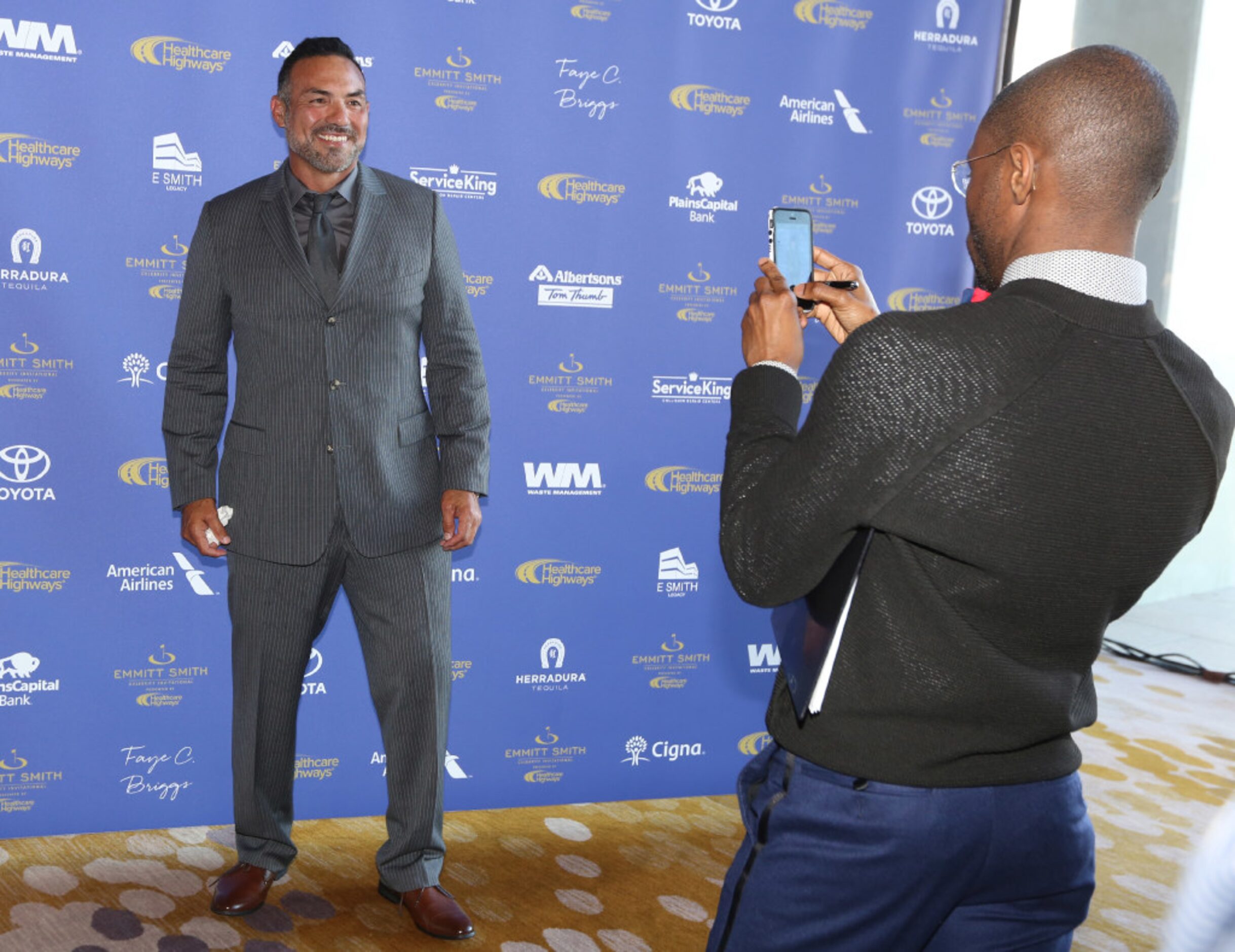 Former Dallas Cowboy Tony Casillas poses for photographers during the red carpet walk at the...