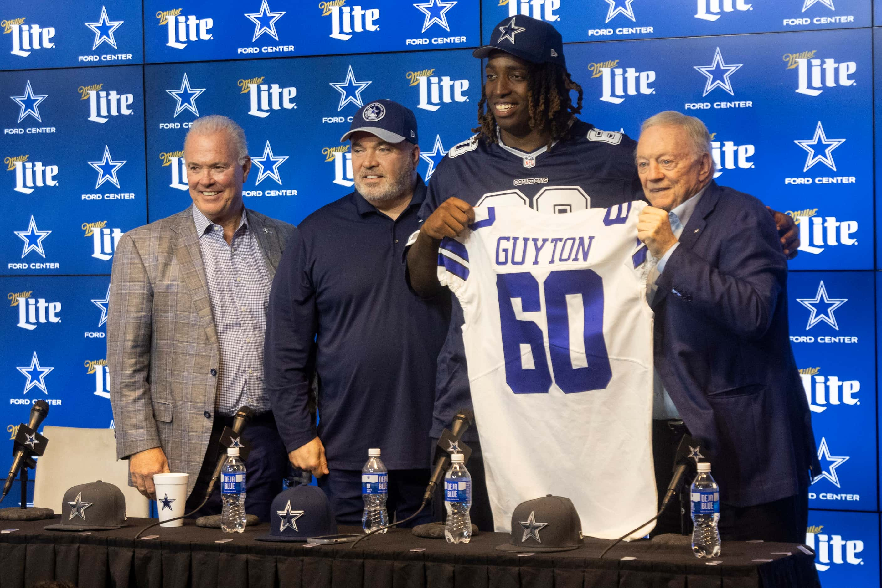 From left, Dallas Cowboys executive vice president Stephen Jones, head coach Mike McCarthy,...