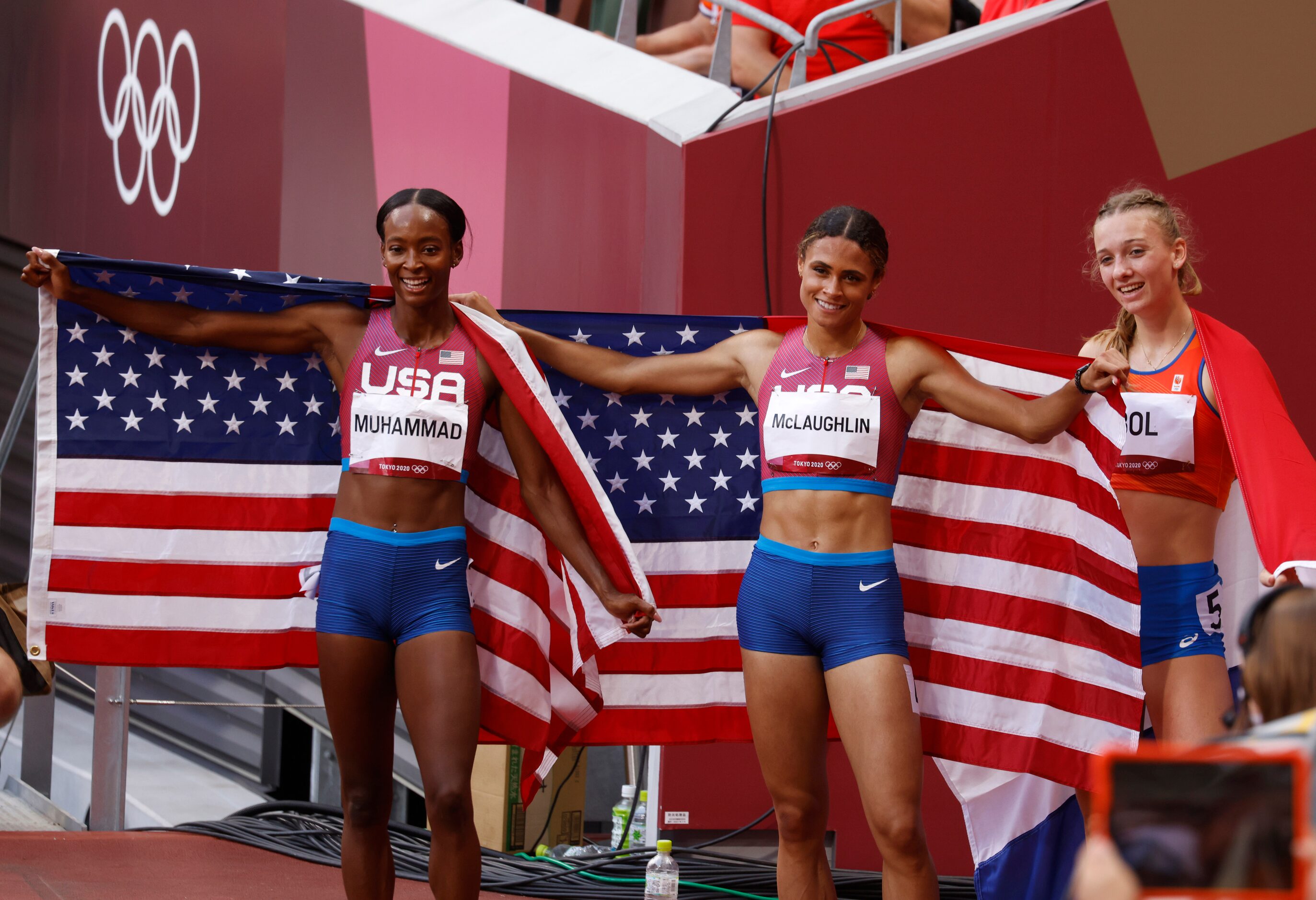 USA’s Dalilah Muhammad, USA’s Sydney McLaughlin, and the Netherland’s Femke Bol pose for...