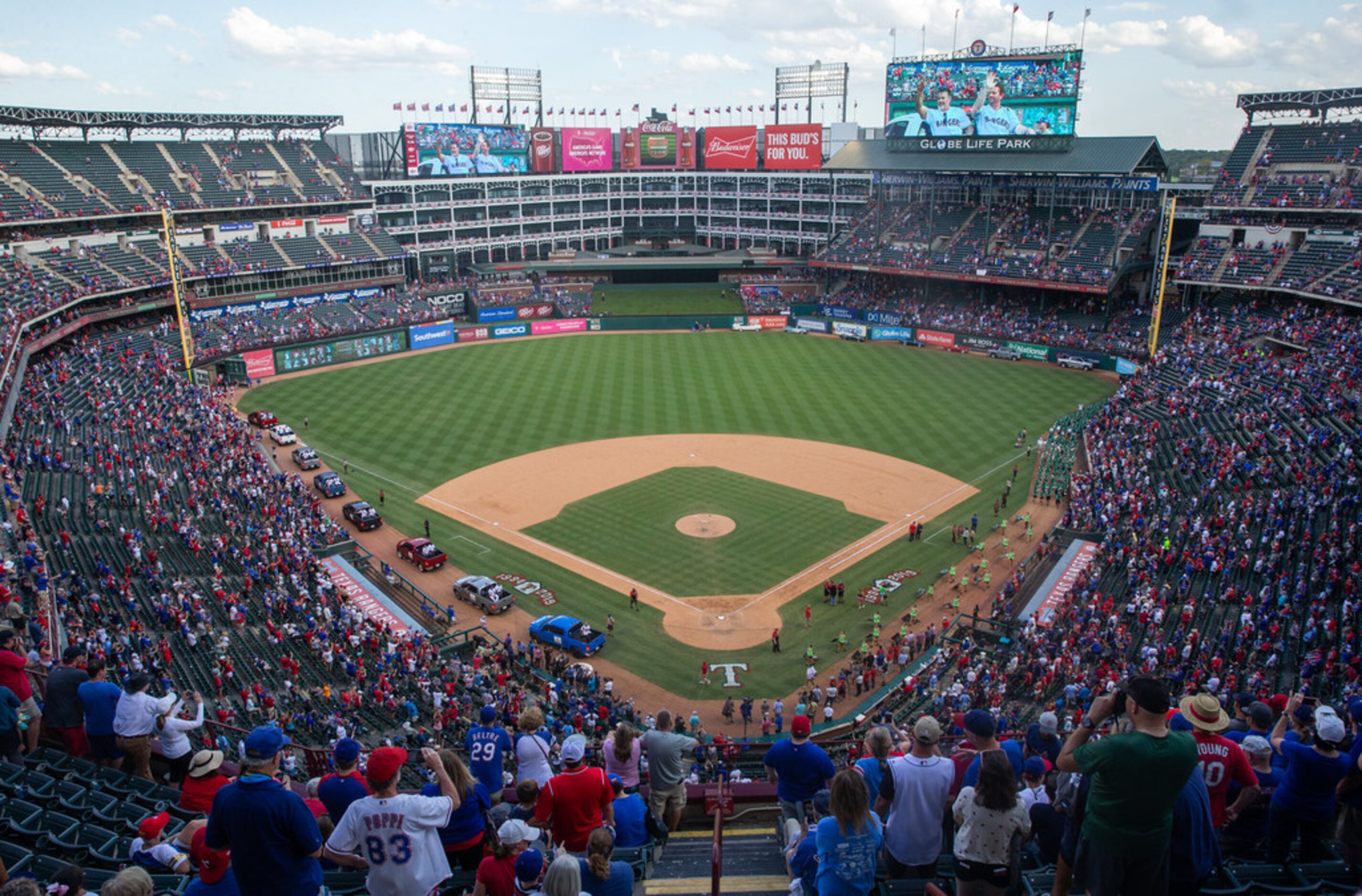 A parade to relocate home plate takes place following the Texas Rangers' final game ever...