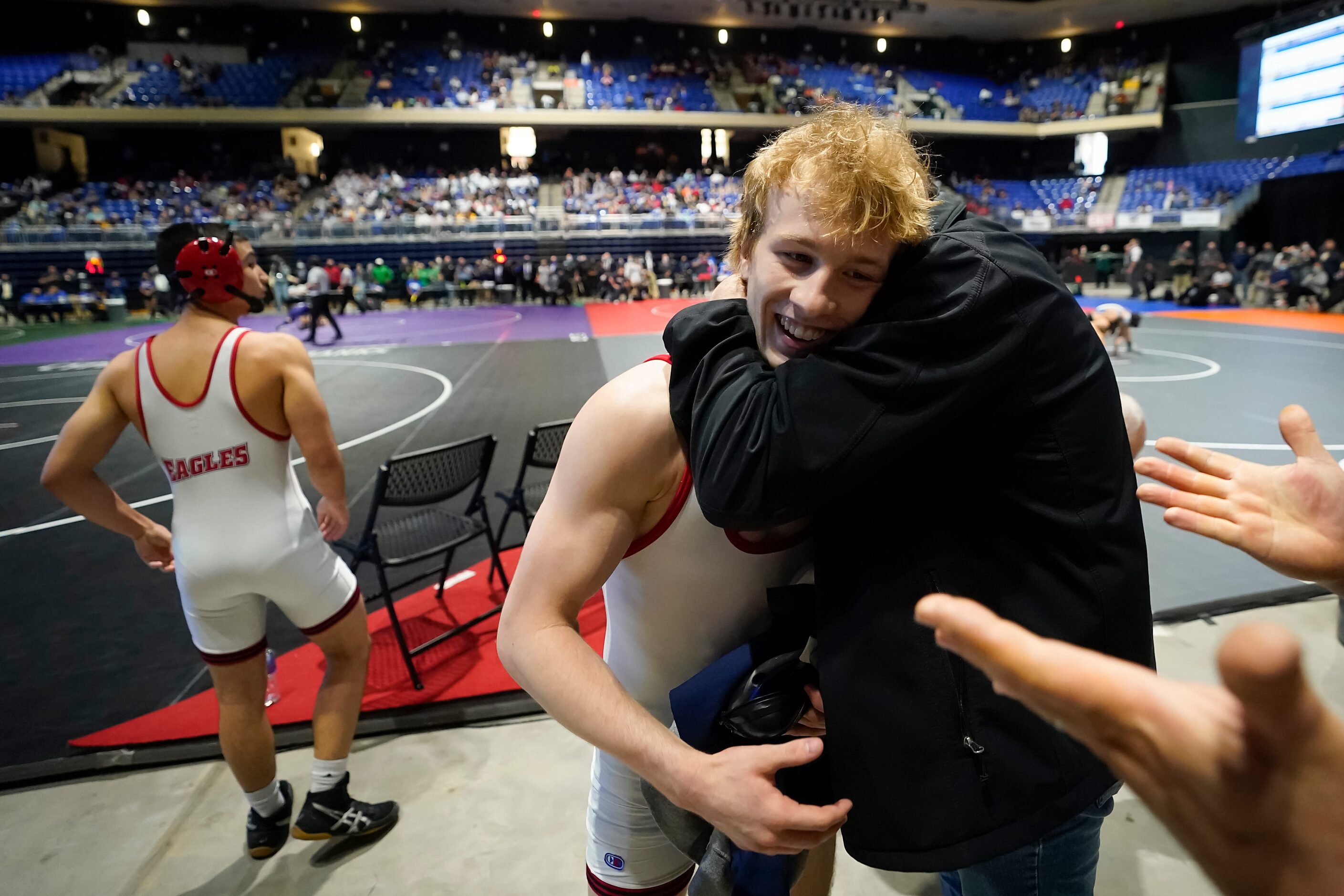 Braxton Brown of Allen celebrates after beating  Micah White of Humble Kingwood for the 6A...