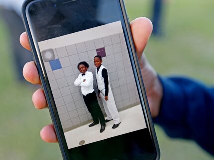 Cameron Jackson shows a photograph of him and Jordan Edwards saved in his cell phone at a...