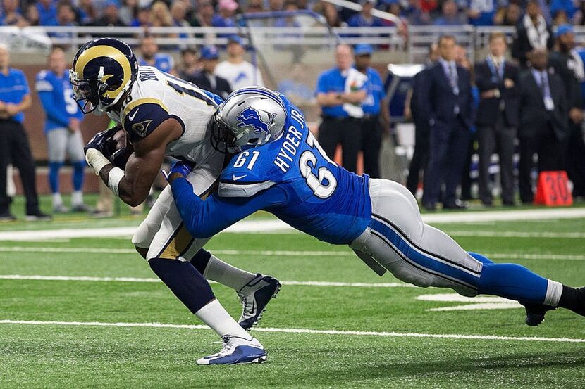 DETROIT, MI - OCTOBER 16: Wide receiver Kenny Britt #18 of the Los Angeles Rams runs with...