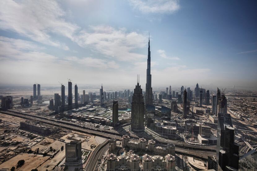 The world's tallest building, the Burj Khalifa, towers over Dubai in the United Arab...
