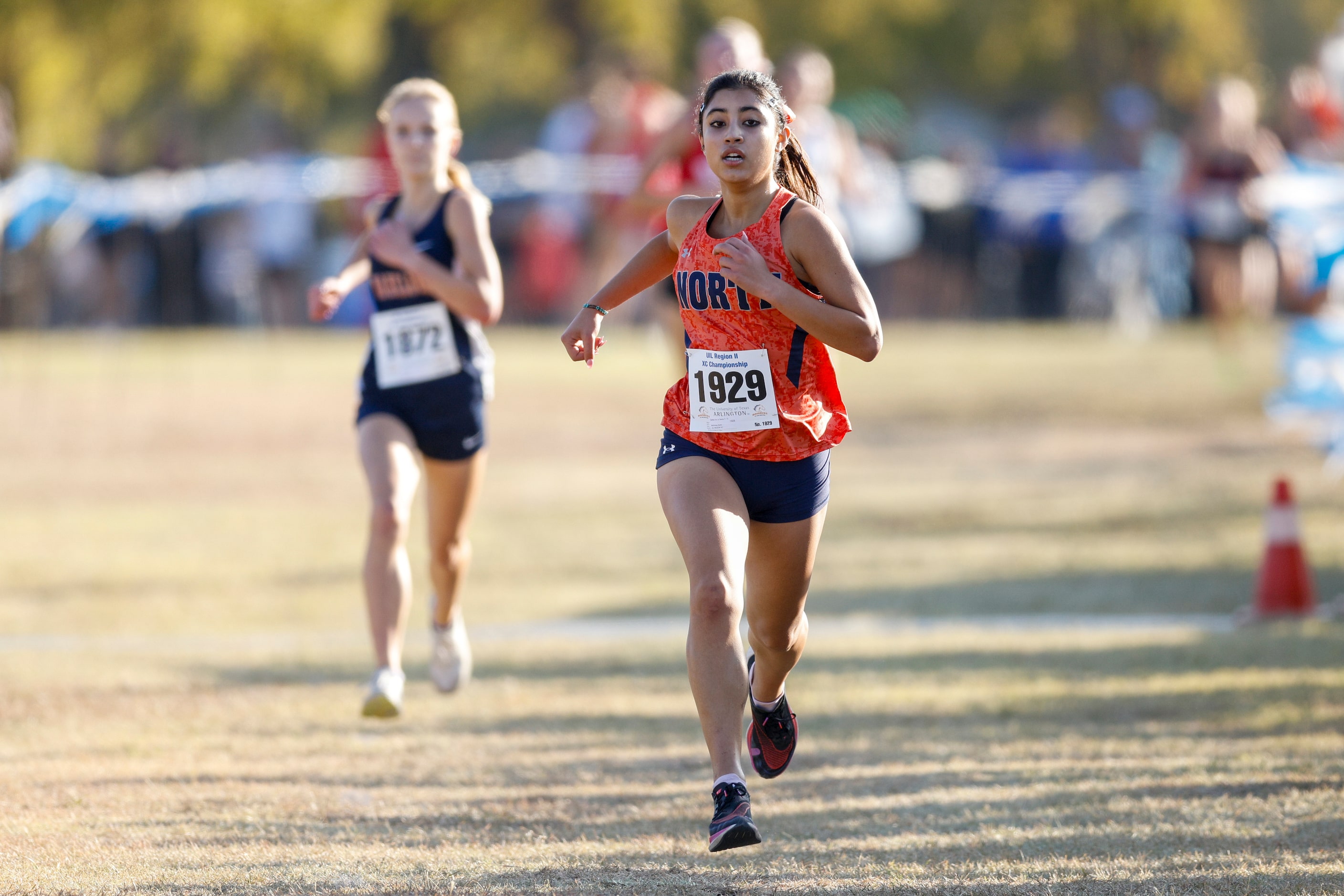 McKinney North’s Galilea De La Garza nears the finish line during the UIL Class 5A Region II...