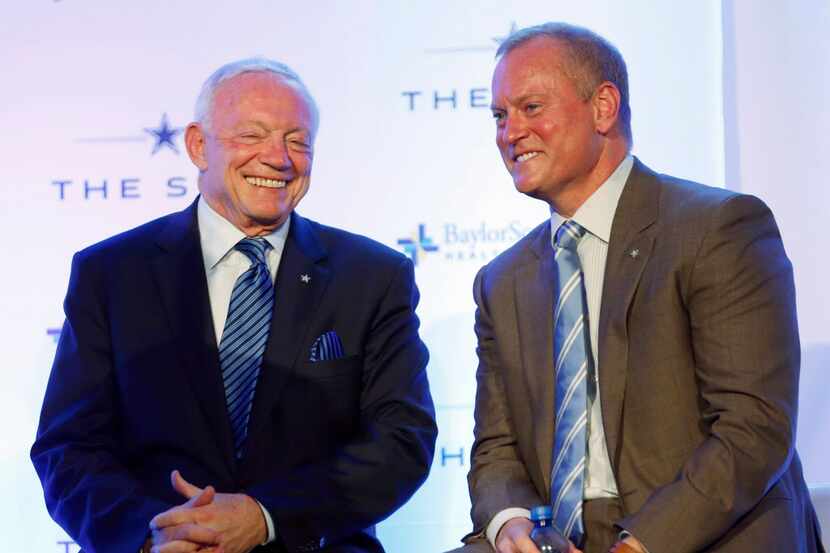 Dallas Cowboys owner and general manager Jerry Jones shares a laugh with Dallas Cowboys...