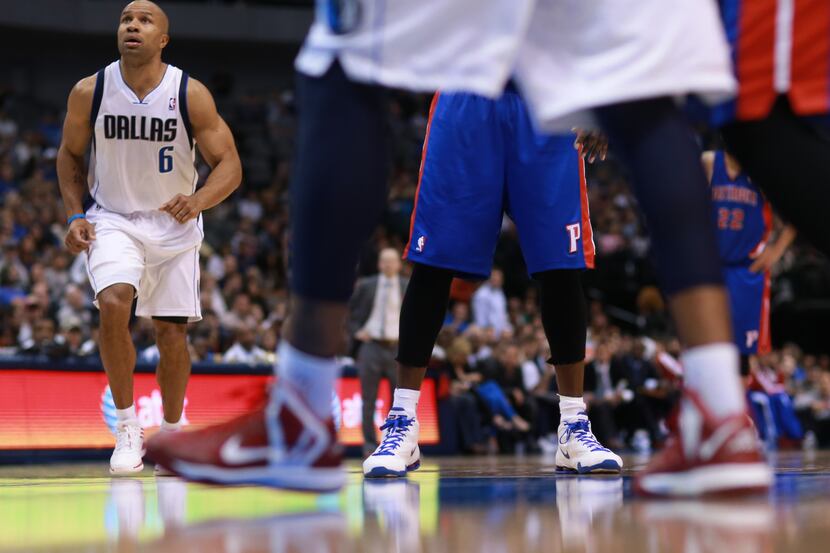 Dallas Mavericks' Derek Fisher watches the rim on a Pistons' foul shot during the second...