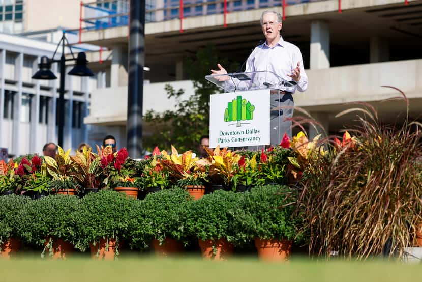Downtown Dallas Parks Conservancy chairman Robert Decherd speaks during the opening ceremony...