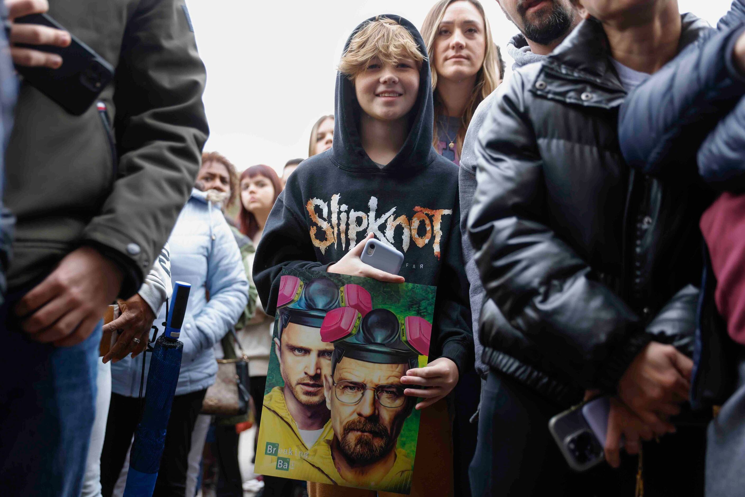 Korbin Mason, 13, of Dallas, holding a Breaking Bad poster eagerly wait for actors Bryan...