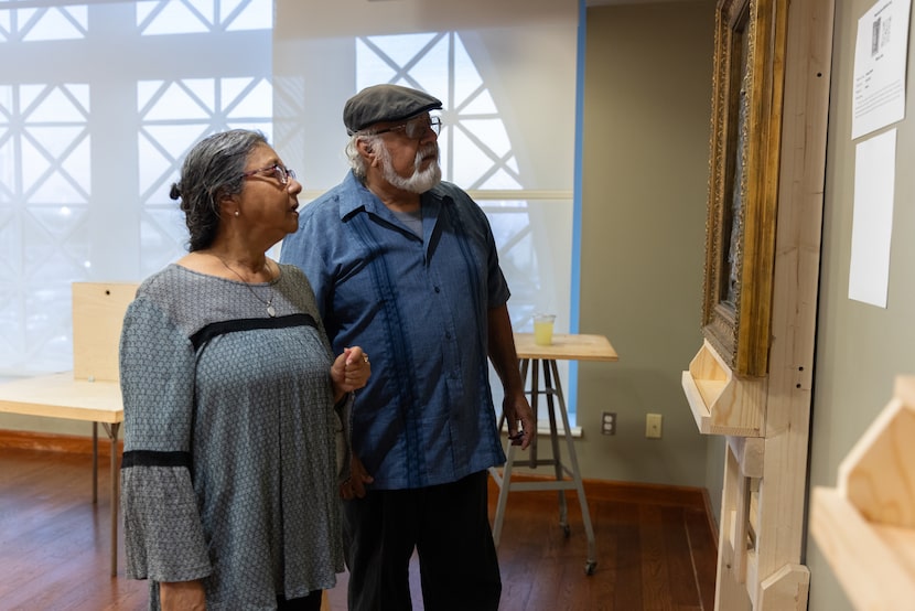  Tomas Bustos and his wife, Jacinta, in his exhibit “Masterpiece Relief for the Blind” at...