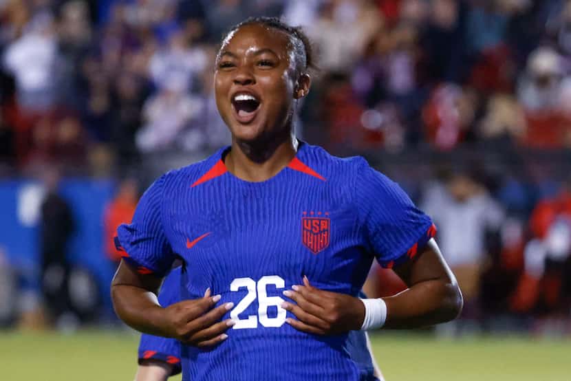 United States' Jaedyn Shaw (26) celebrates her first international goal during the second...