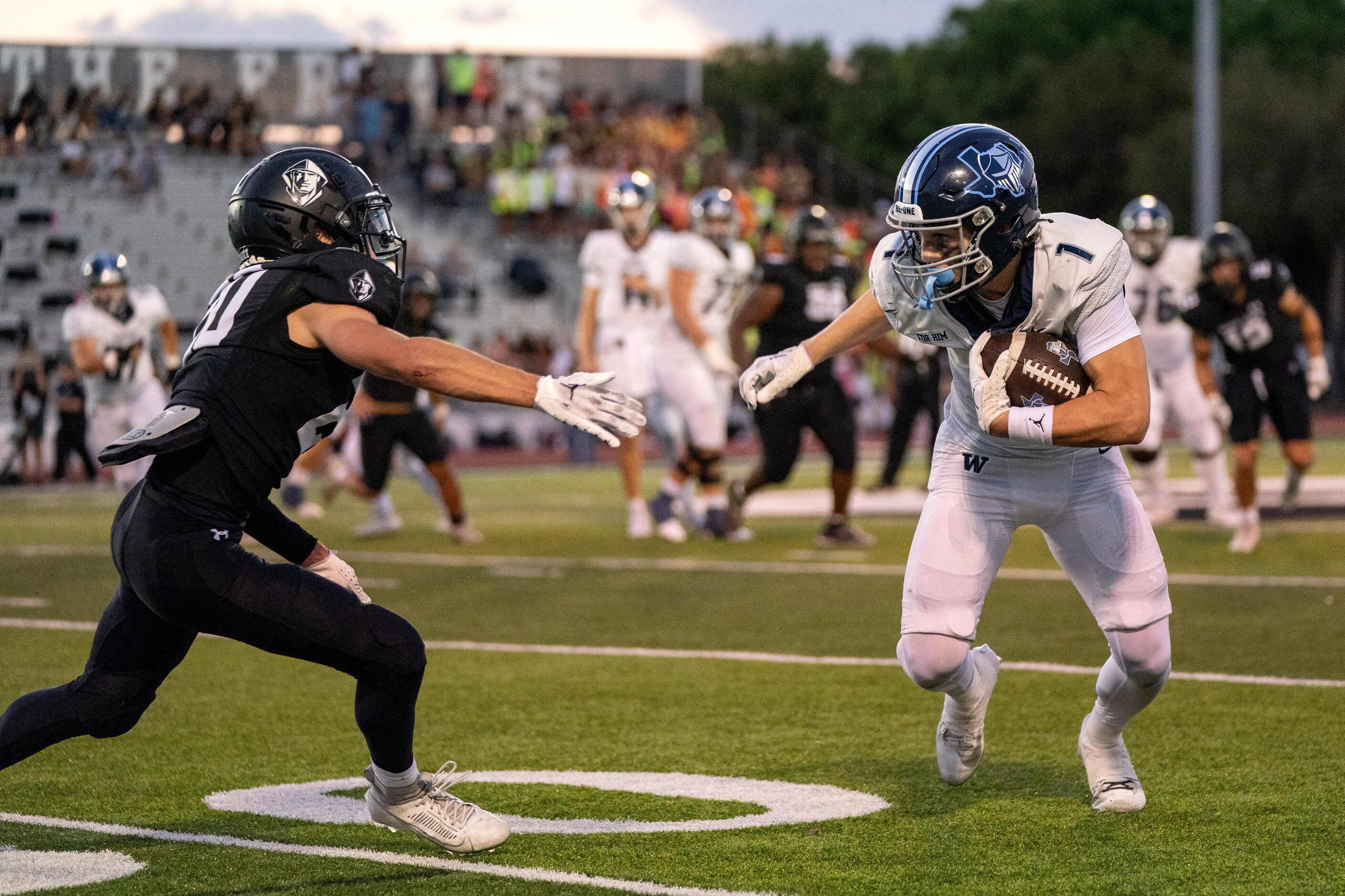 Argyle Liberty Christian senior wide receiver Michael Stump (1) tries to get past Bishop...