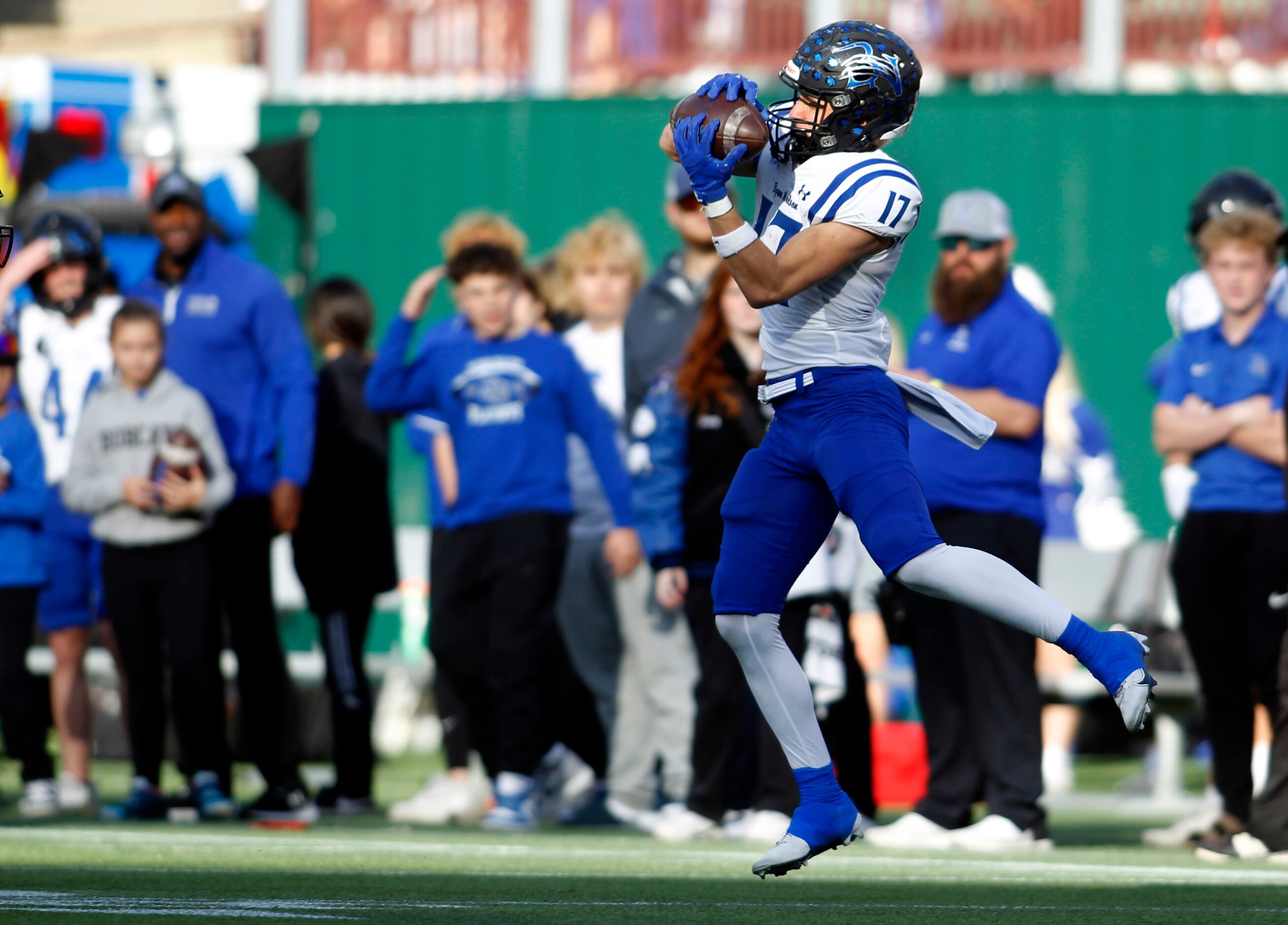 Byron Nelson receiver Landon Farco (17) leaps to pull in a pass during first quarter action...