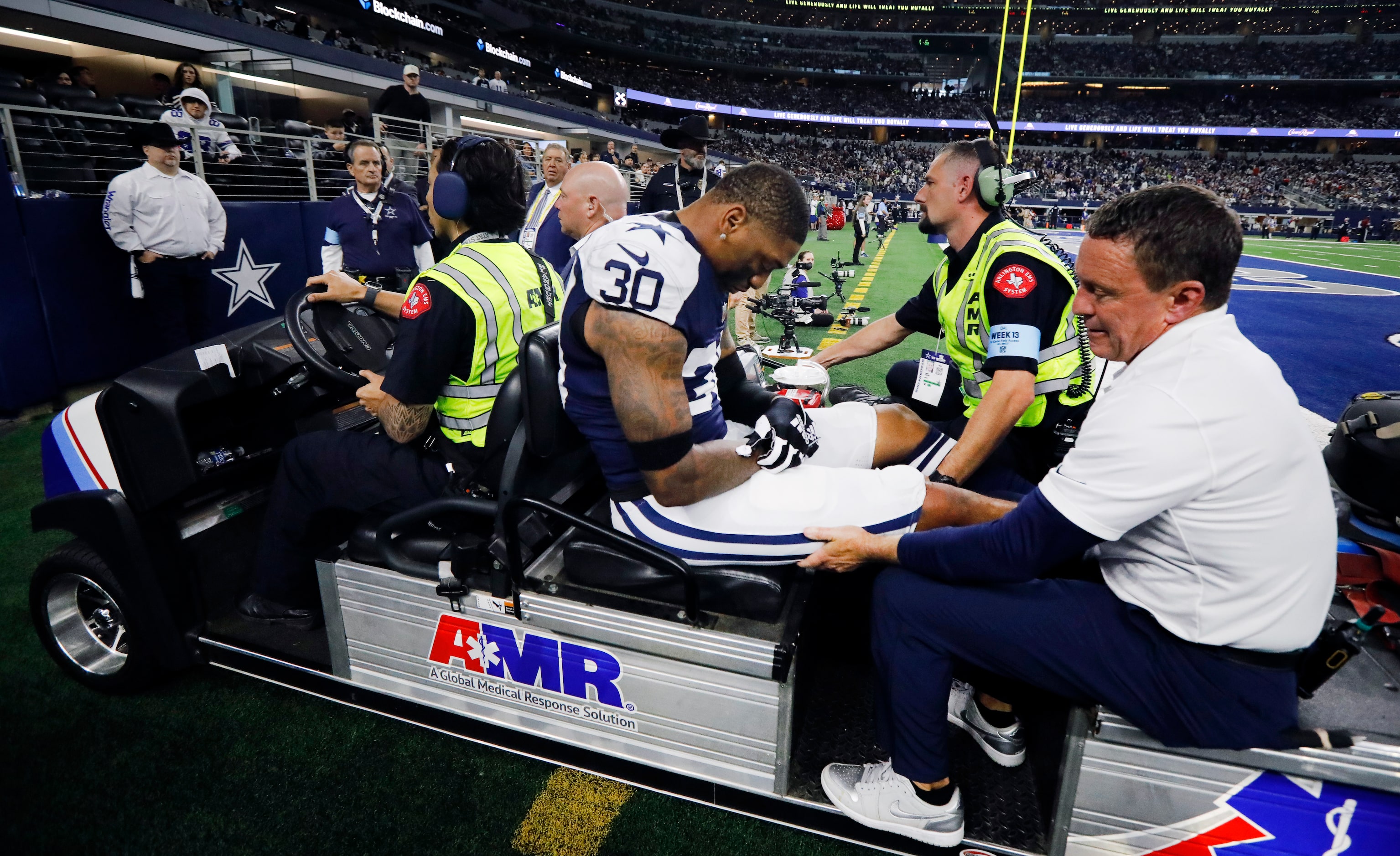 Dallas Cowboys safety Juanyeh Thomas (30) is carted off the field after sustaining a first...