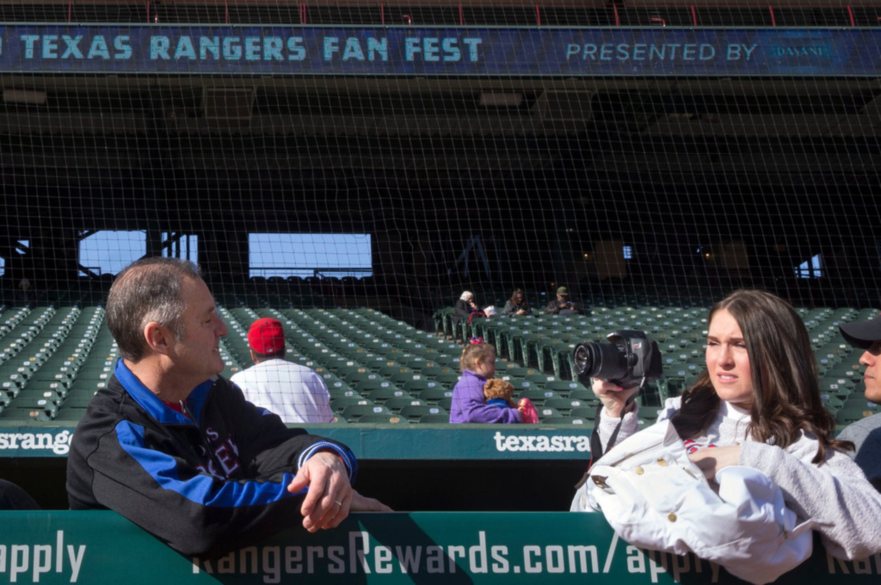 Bryan Hays of Arlington, left, has his picture taken by his daughter, Sarah Hays, in the...