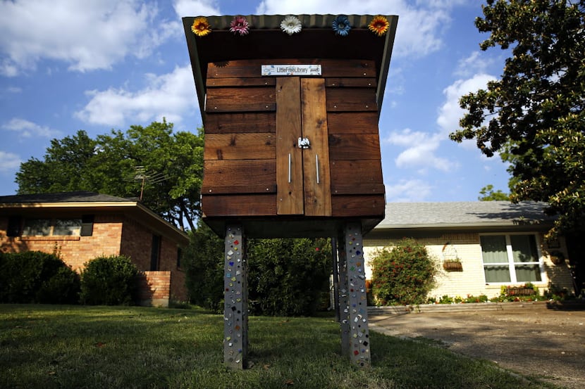 Stacy Holmes' Little Free Library in Lake Highlands, which sparked the city's attempt to...