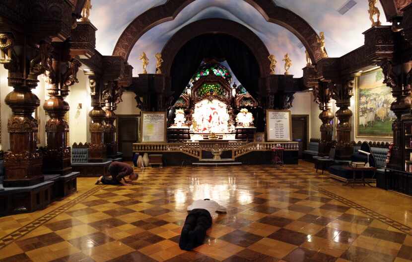 Worshippers pray at the Krishna temple in Old East Dallas.