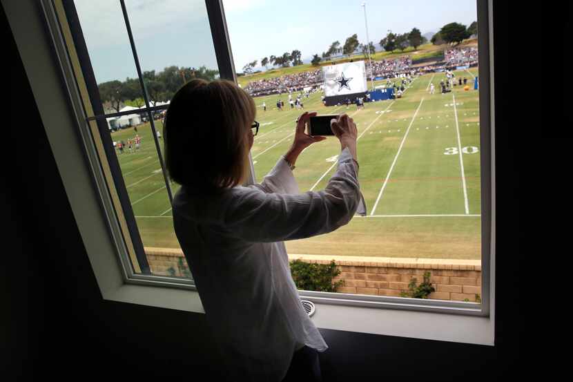 Homeowner Michelle Payne photographed the Dallas Cowboys training camp practice from her...