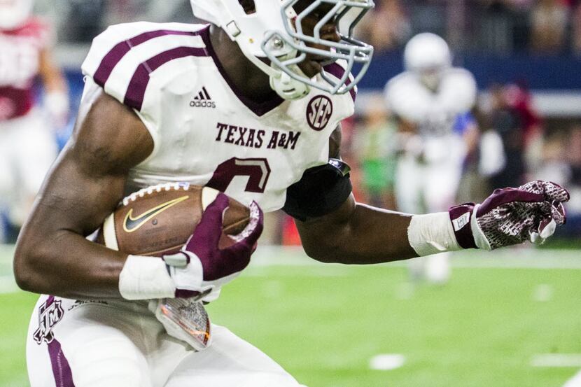 Texas A&M Aggies defensive back Donovan Wilson (6) catches an interception during the second...