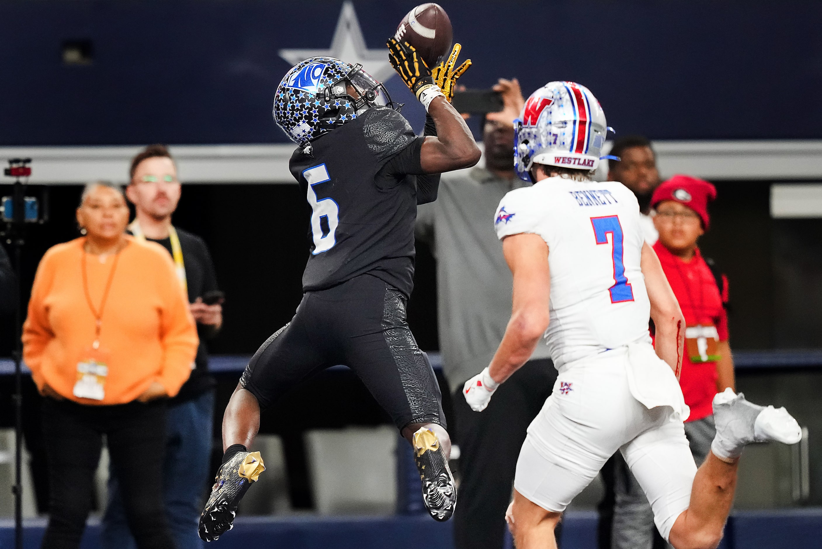 North Crowley wide receiver Quentin Gibson (6) catches a touchdown pass as Austin Westlake...