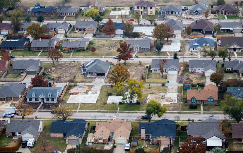 Homes near Dalrock Road as photographed from a helicopter in Rowlett, where there are about...