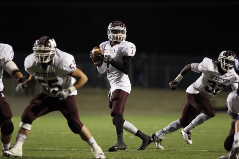 Mesquite High School quarterback Alex Cooper (7) looks for a receiver against Sachse during...
