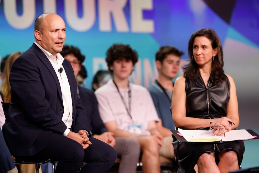 Former Israel Prime Minister Naftali Bennett (left) speaks alongside New York Times...