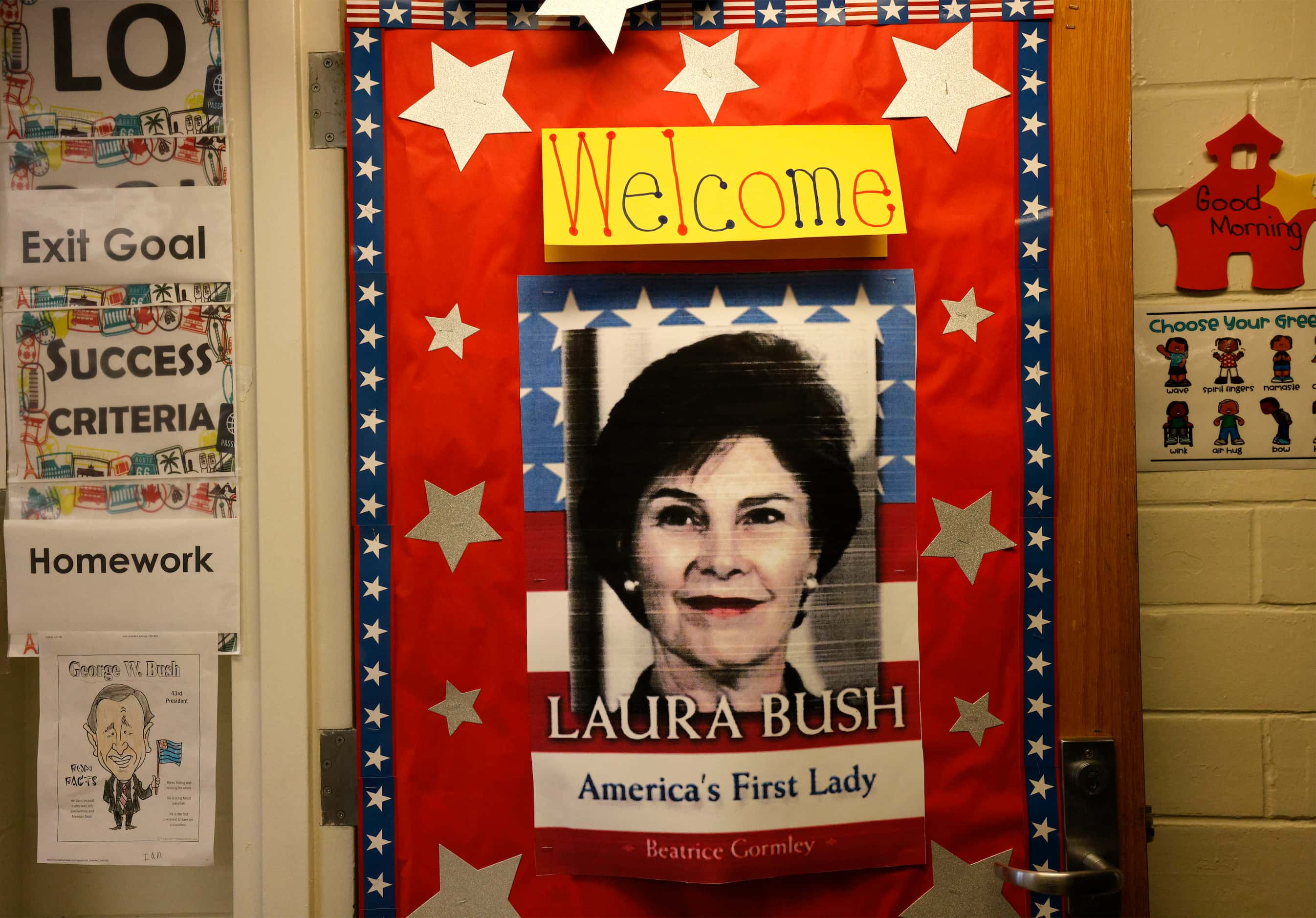 A welcome sign for former first lady Laura Bush is posted at the entrance of a first...