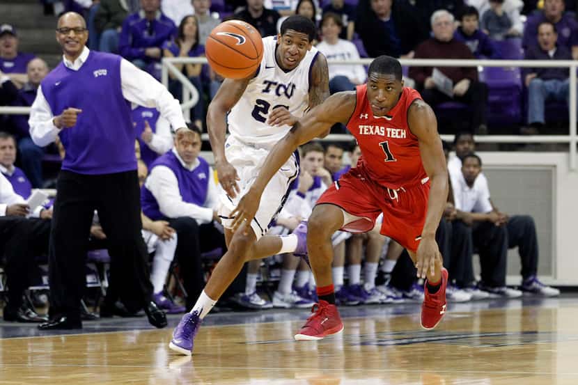TCU guard Jarvis Ray (22) and Texas Tech guard Randy Onwuasor (1) go for a loose ball in the...