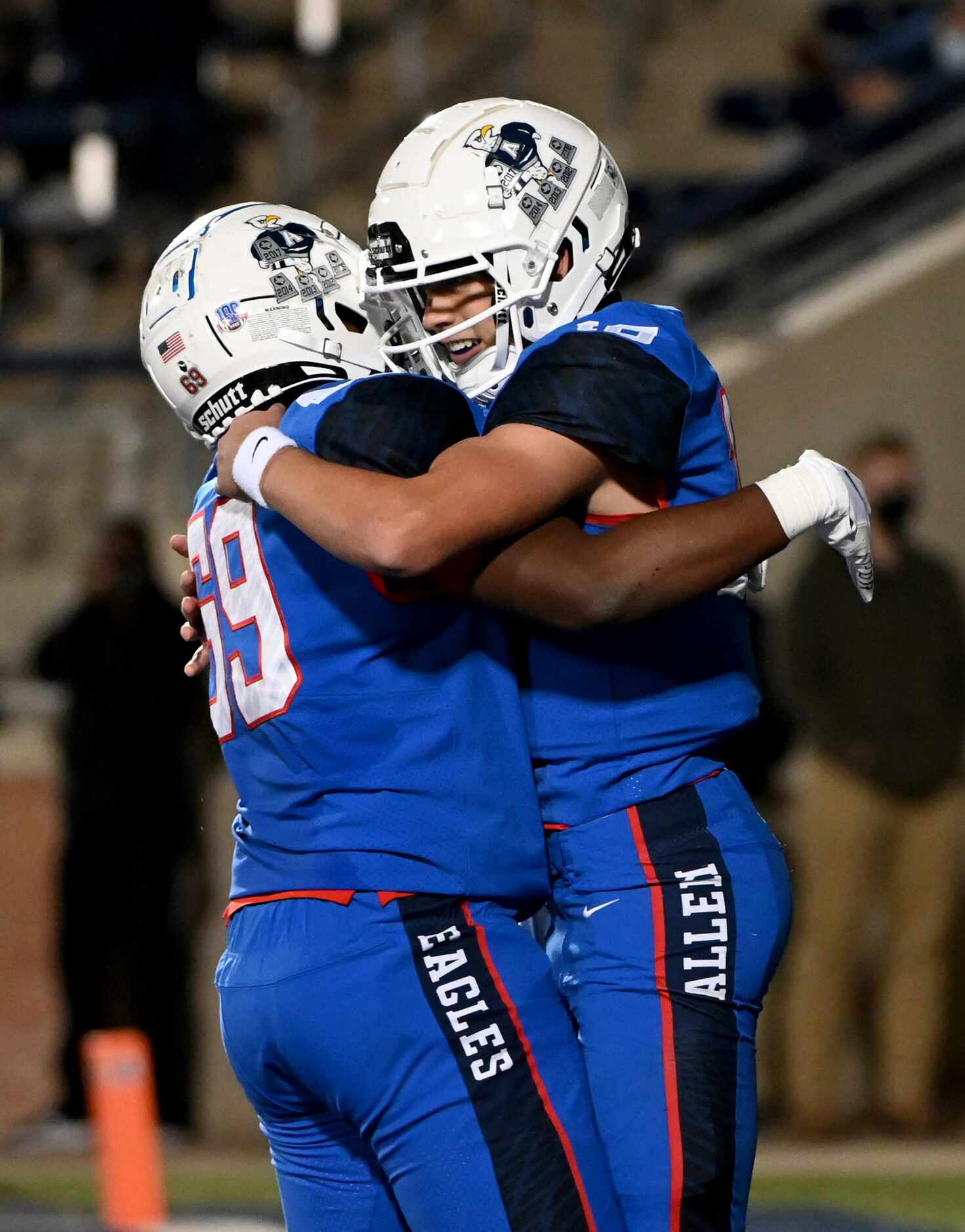 Allen’s General Booty, right, celebrates his touchdown with Antony Harris in the third...