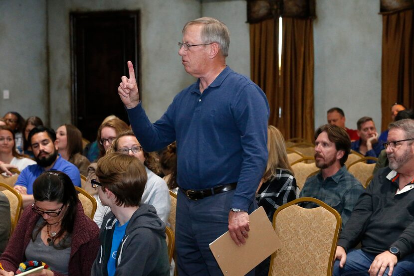 McKinney resident Mike Giles expresses an idea at a town hall on school safety hosted by the...