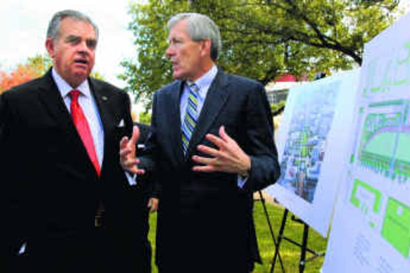  Transportation Secretary Ray LaHood (left) talks with Dallas Mayor Tom Leppert about the...