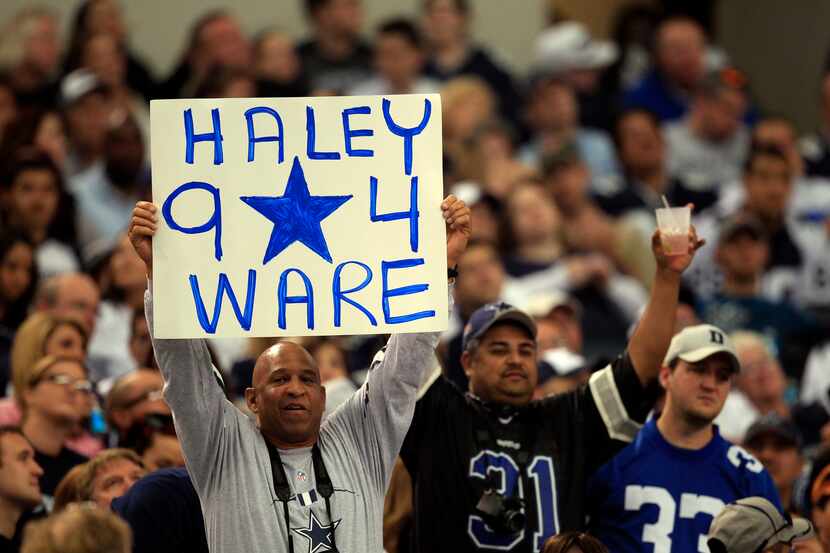 A Dallas Cowboys fan shows his support for former Dallas Cowboys Charles Haley and current...