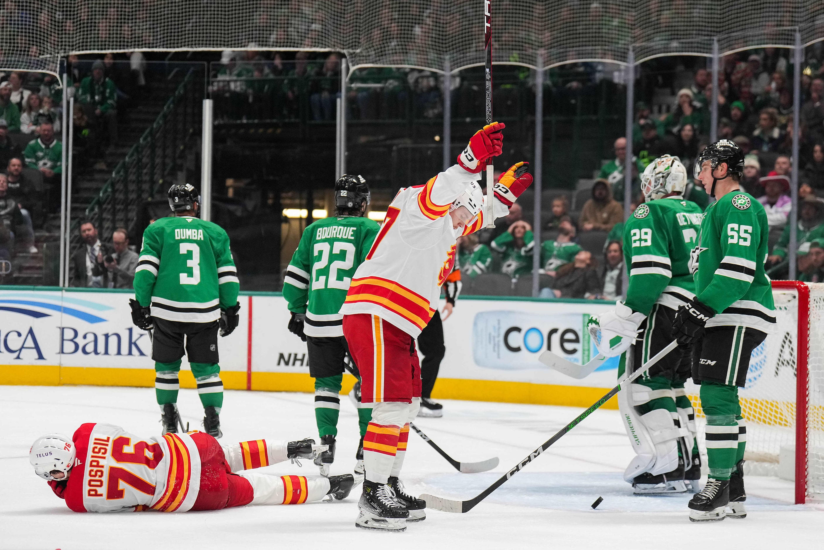 Calgary Flames center Connor Zary (47) celebrates after scoring against Dallas Stars...