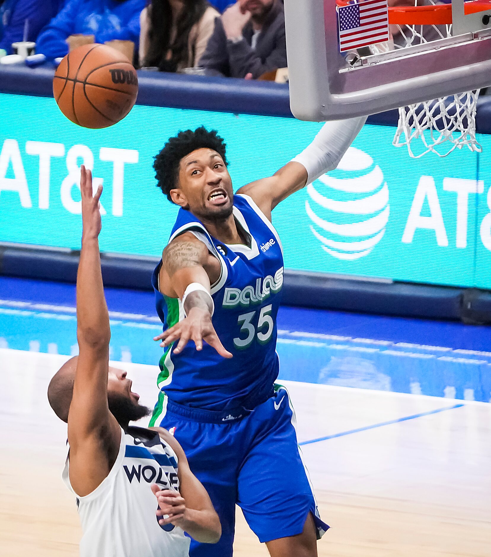 Minnesota Timberwolves guard Jordan McLaughlin (6) shoots past Dallas Mavericks forward...