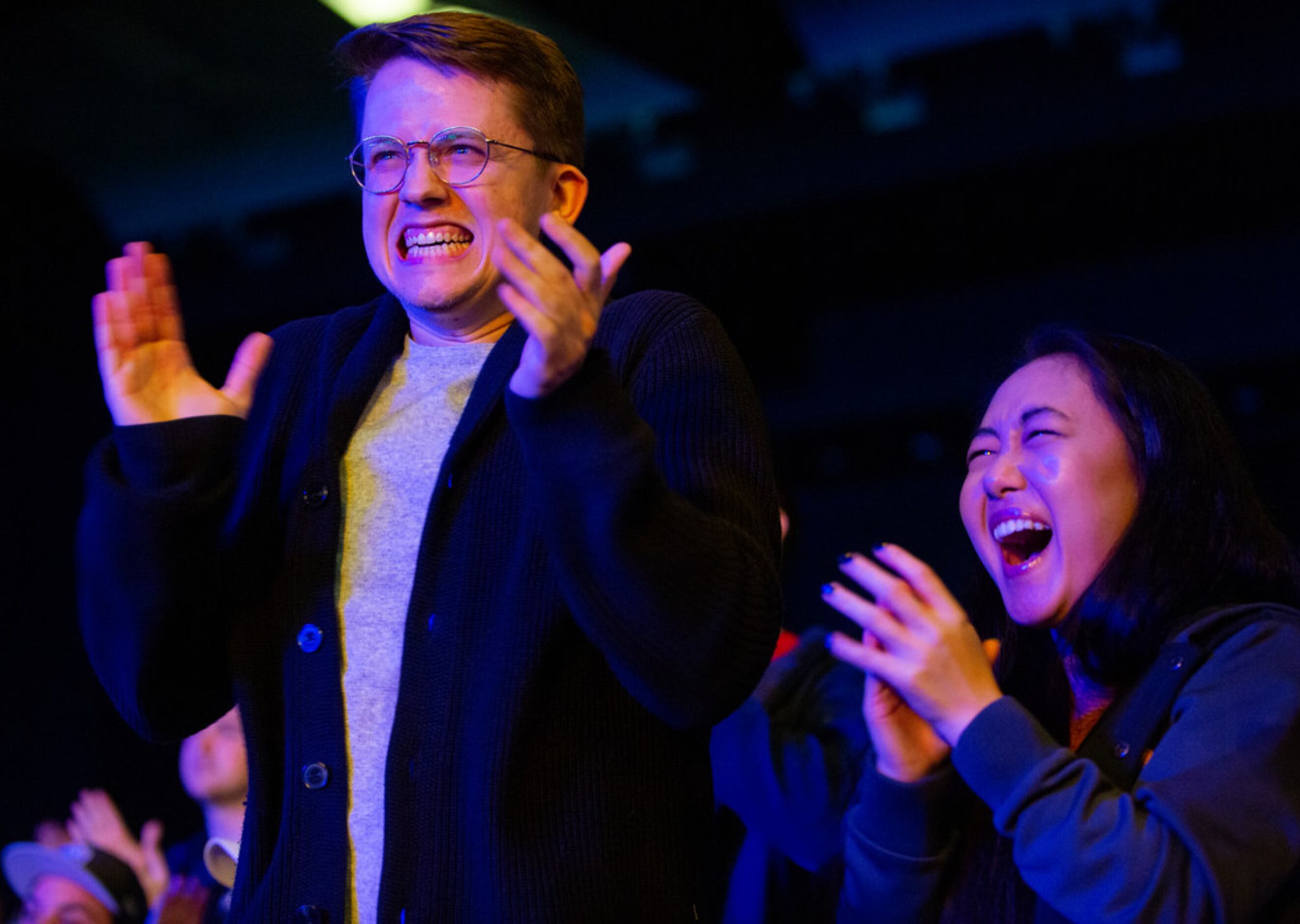 Oscar Vallner (left) and Daisy Wang from Dallas celebrate the Dallas Fuel's third map win...