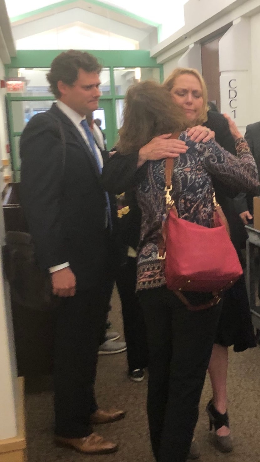 Tarrant County Assistant District Attorney Lori Varnell hugs a victim after a sentencing...