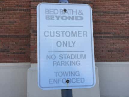 Similar signs are located throughout Lincoln Square shopping center in Arlington.