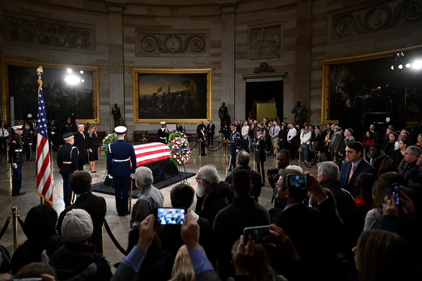 President elect Donald Trump and his wife Melania Trump visit the flag draped casket of the...