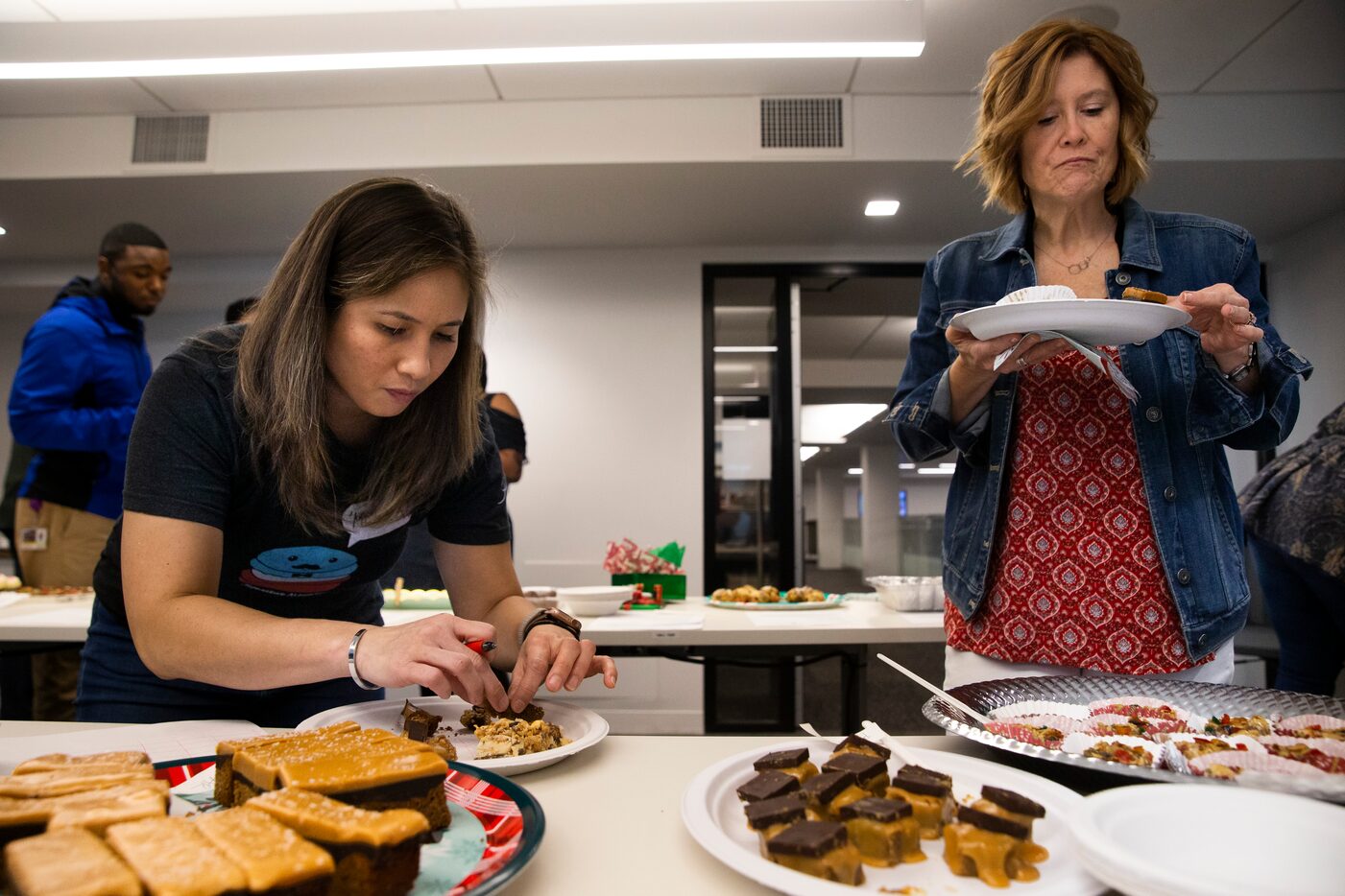 Judge Tida Pichakron of Haute Sweet Patisserie and reader judge Kelly Raaum taste cookies...