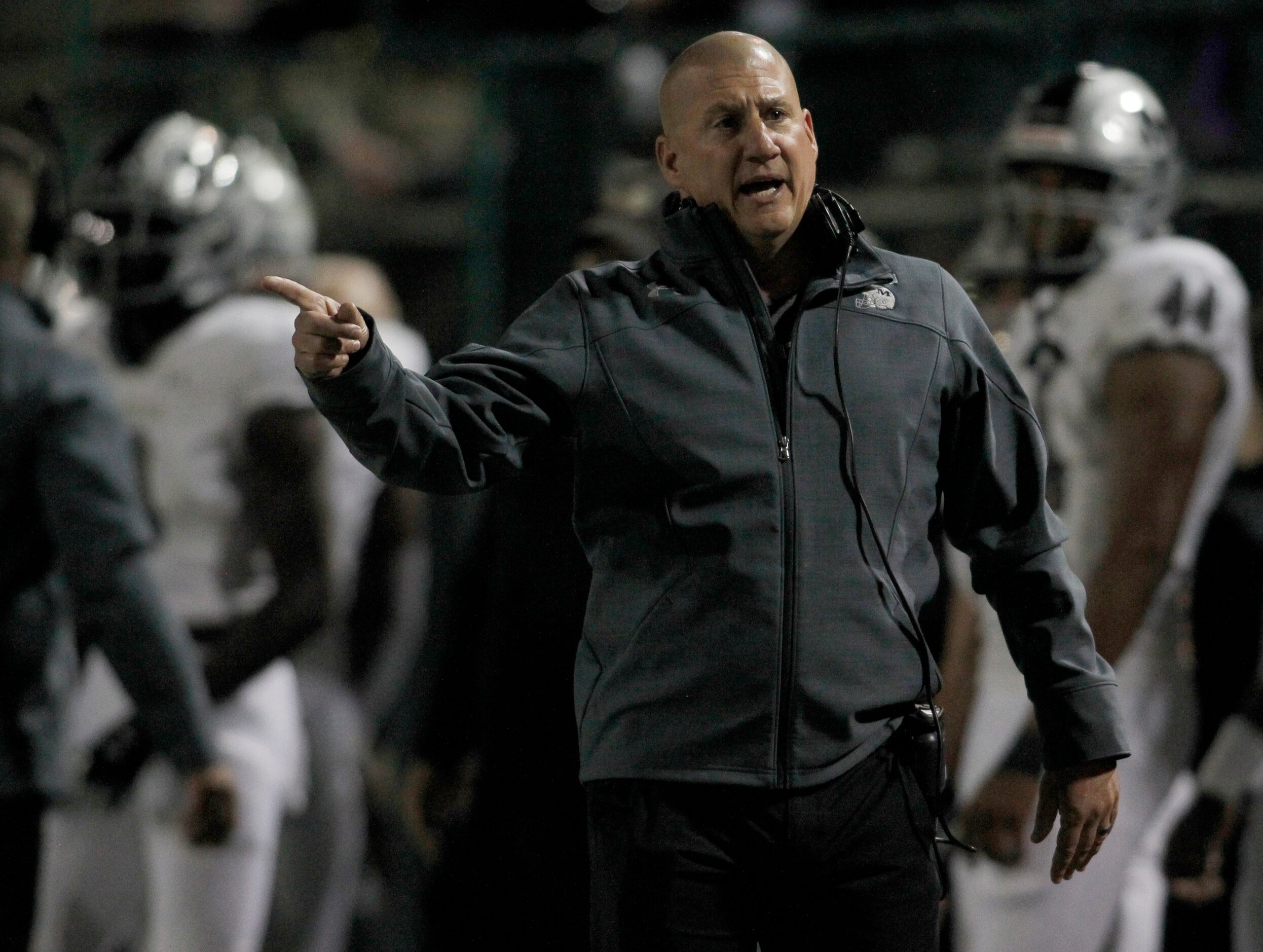 Arlington Martin head coach Bob Wager questions the call from a game official during first...