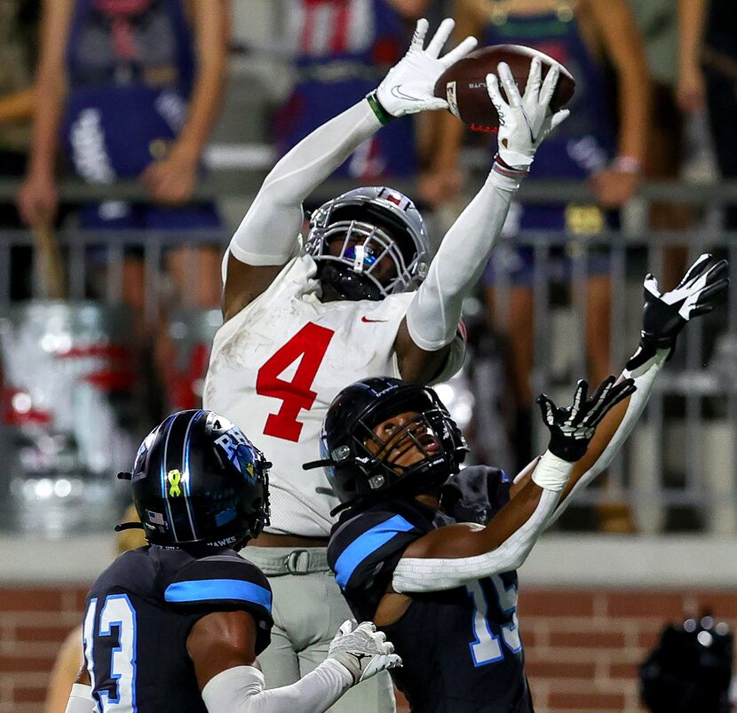 Lovejoy wide receiver Kyle Parker (4) hauls in a reception against Prosper Rock Hill...