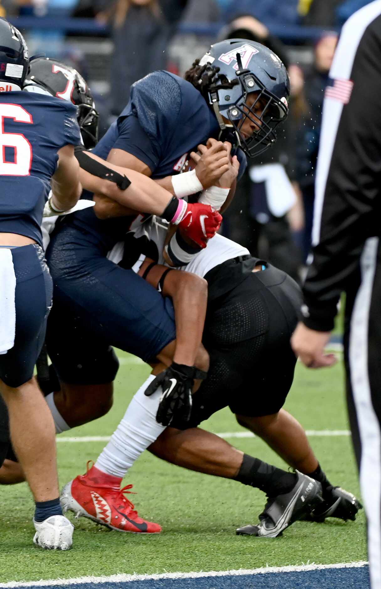 Allen's Mike Hawkins (3) scores a rushing touchdown in the first half of Class 6A Division I...
