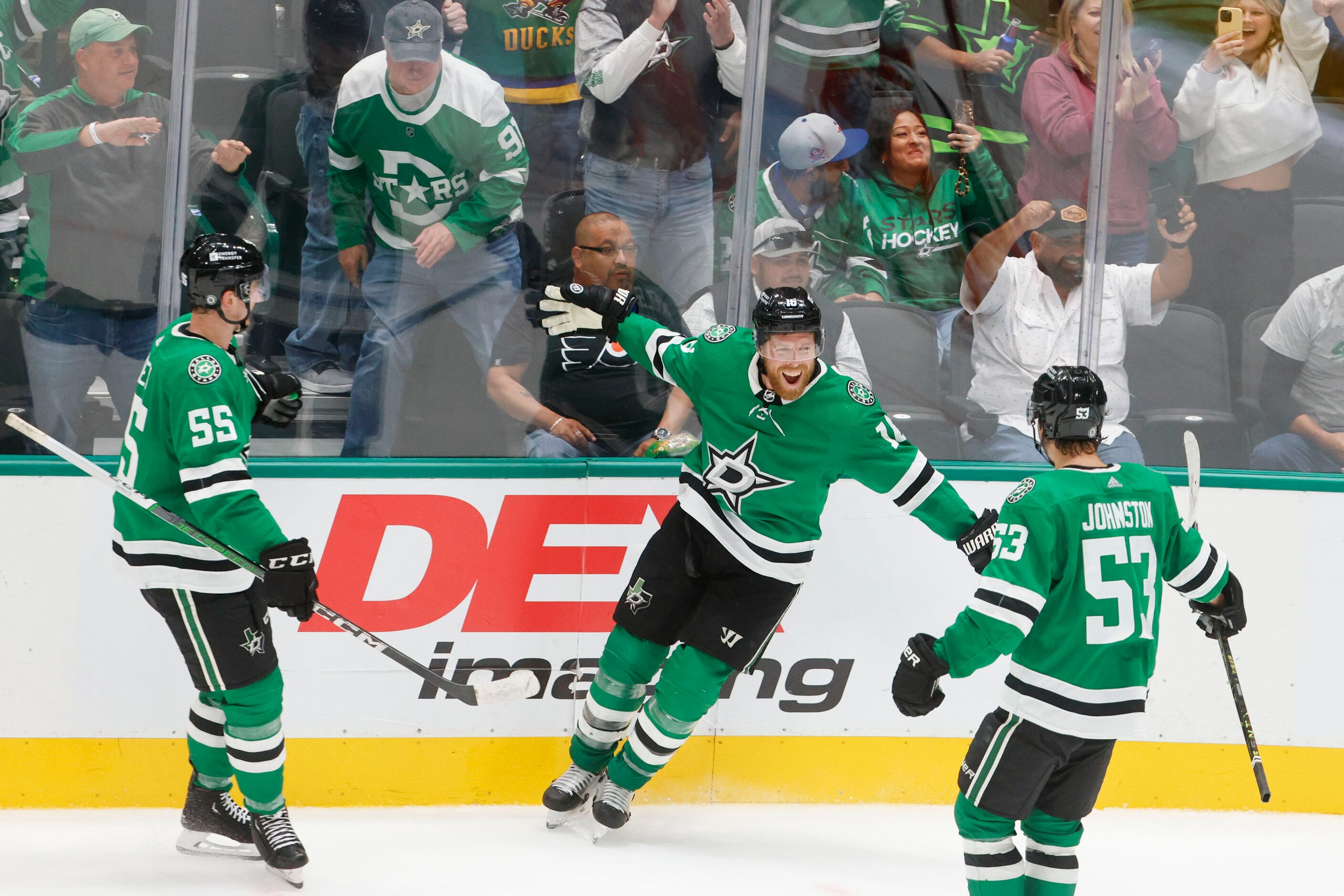 Dallas Stars center Joe Pavelski (center) celebrates his overtime goal with defenseman...