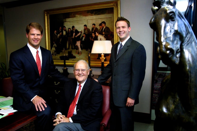 Lamar Hunt (center), the founder of the Dallas Texans, who after 1962 became the Kansas City...