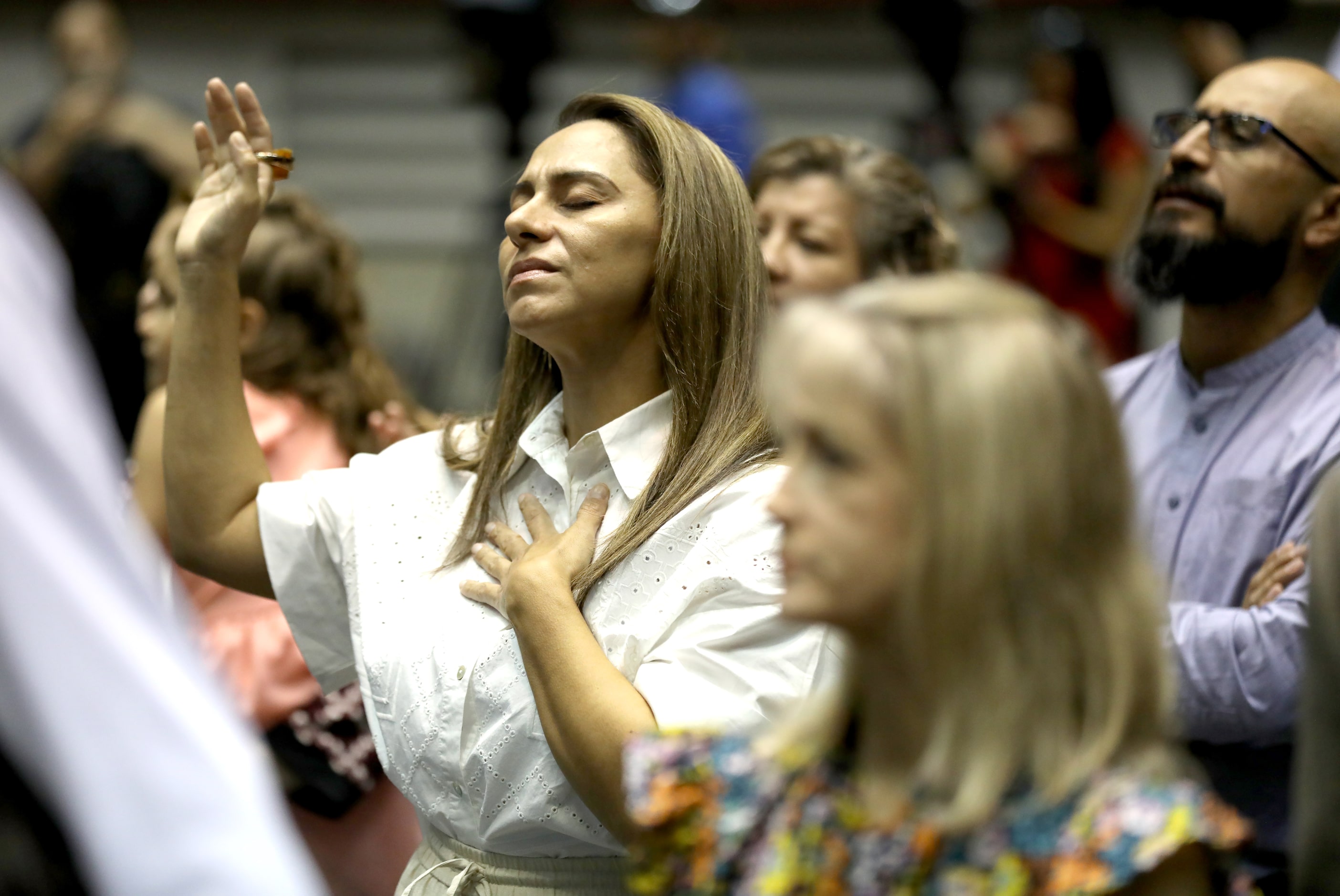 First Baptist Church members participate in Sunday service held at the Dallas Convention...