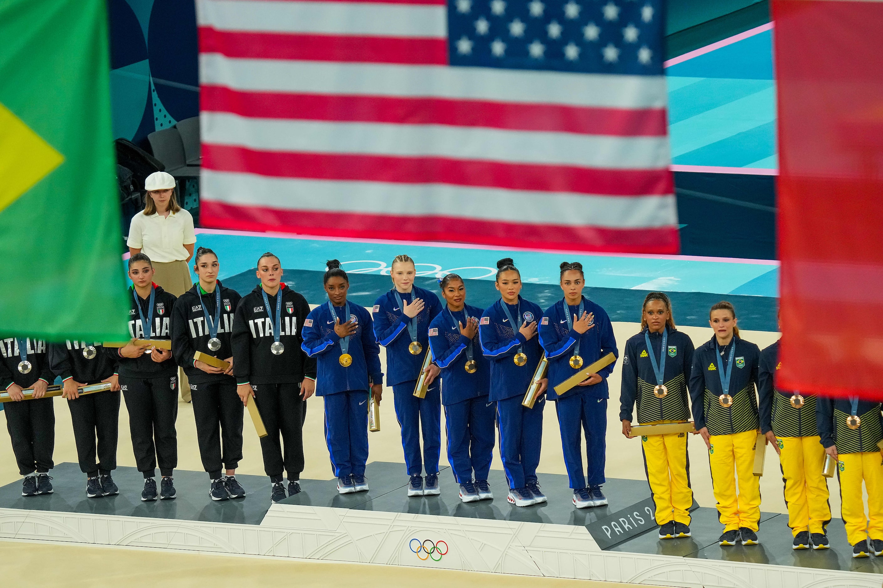 From left, Simone Biles, Jade Carey, Jordan Chiles, Suni Lee and Hezly Rivera of the United...