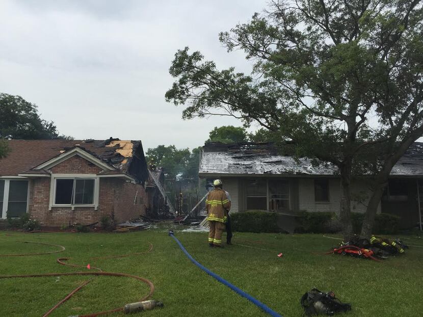  The aftermath of the morning's house fires in the Sparkman neighborhood in Northwest Dallas...