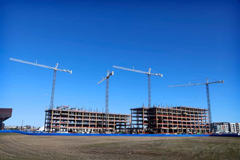 Cranes soared above the Wells Fargo regional offices as construction proceeded on the site...